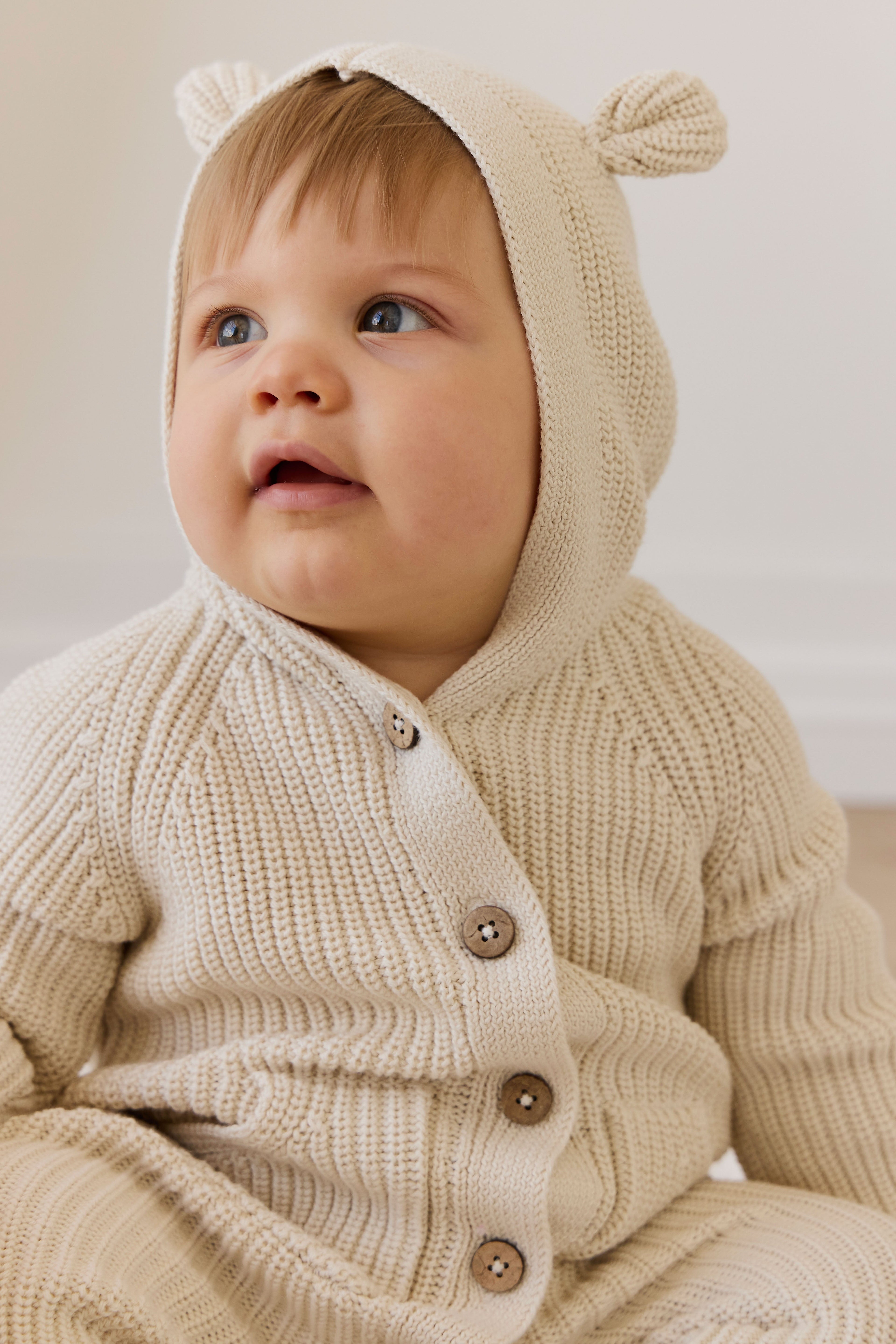 Combinaison bébé-tout-petit en coton tricoté à capuche oreilles d'ours, douce et chaude, couleur vanille et neutre
