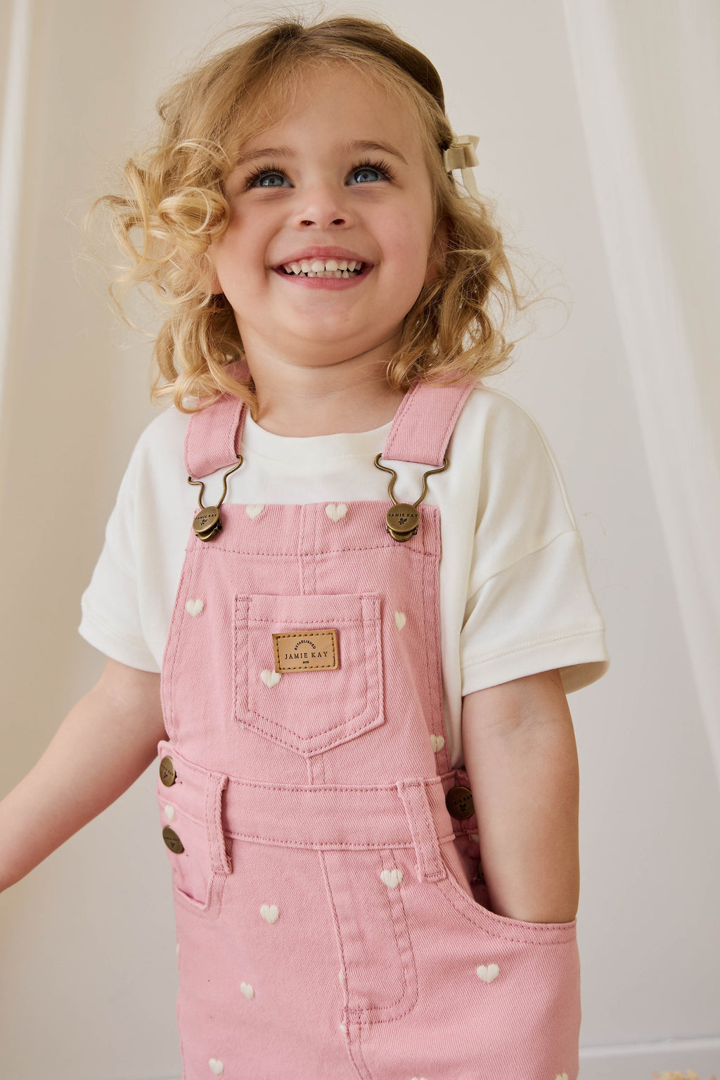 Salopette pour filles à imprimé cœur rose en velours côtelé avec bretelles réglables