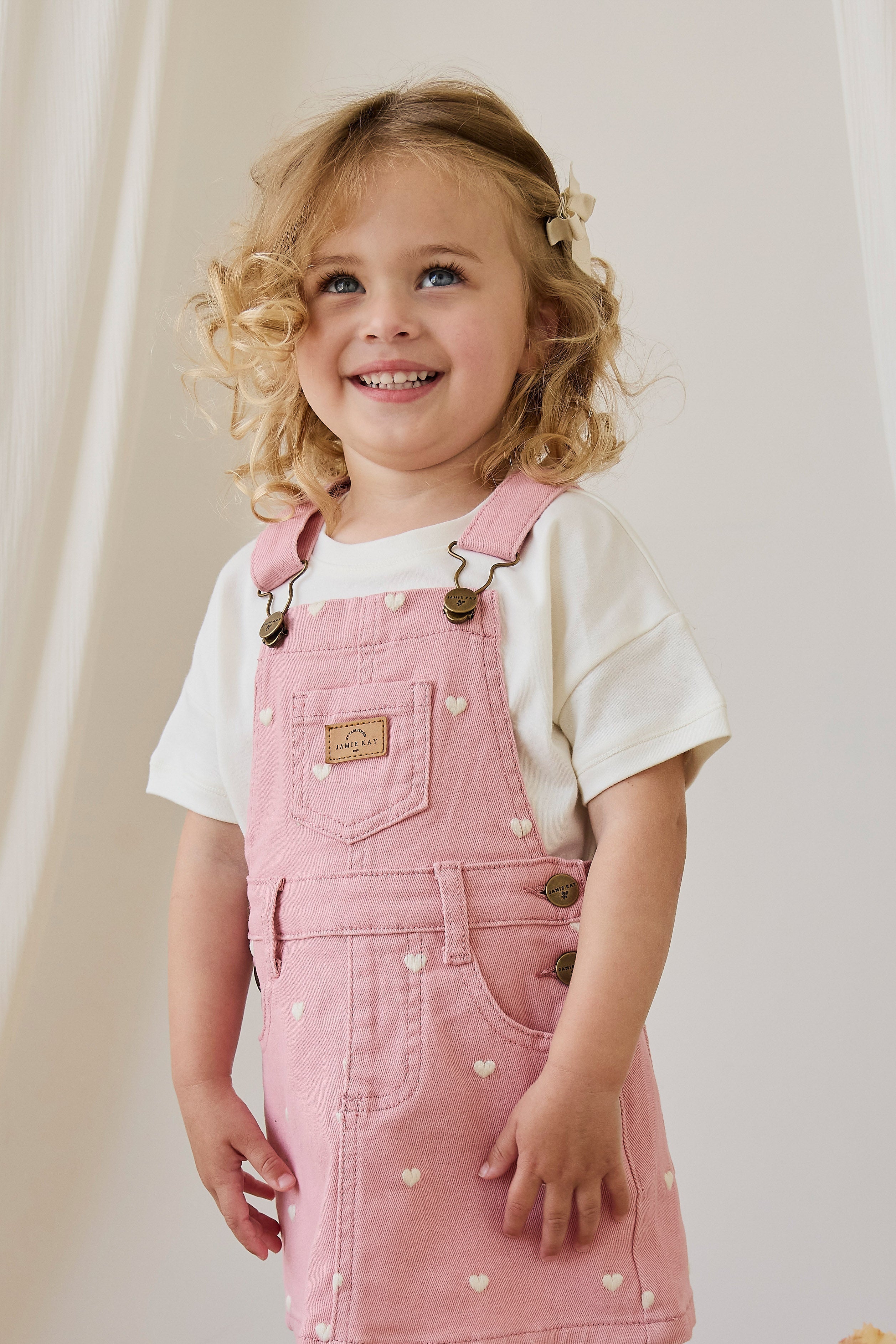Salopette pour filles à imprimé cœur rose en velours côtelé avec bretelles réglables