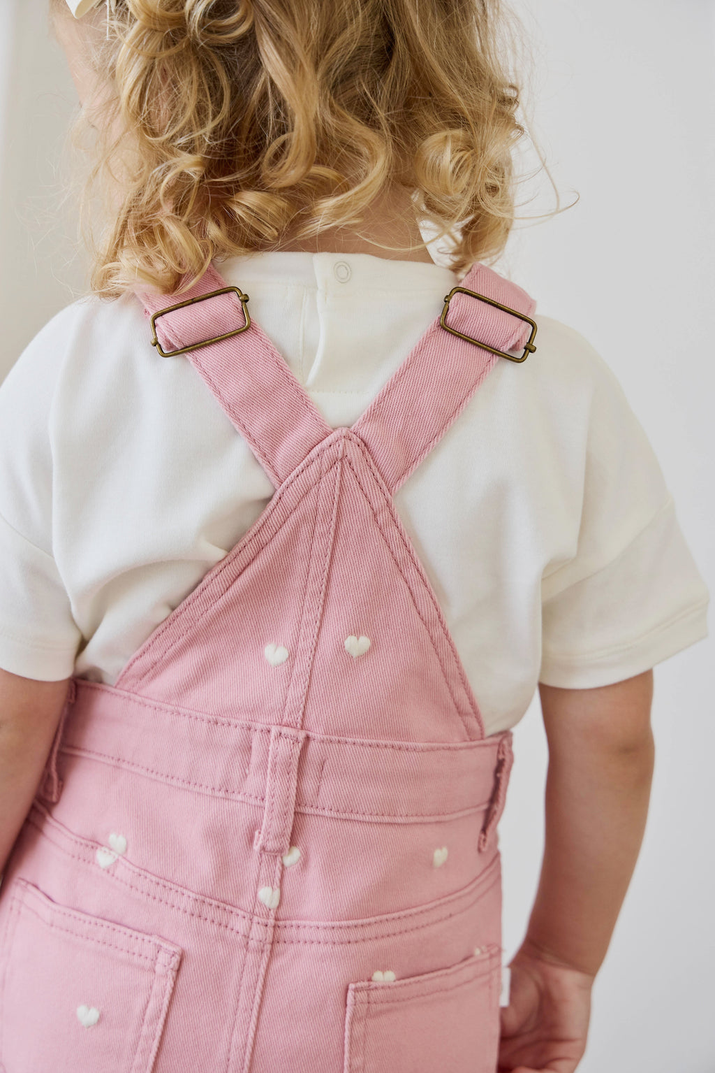 Salopette pour filles à imprimé cœur rose en velours côtelé avec bretelles réglables