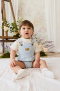 Barboteuse bébé rayée en coton avec bavette devant, bleue et blanche, à bretelles réglables
