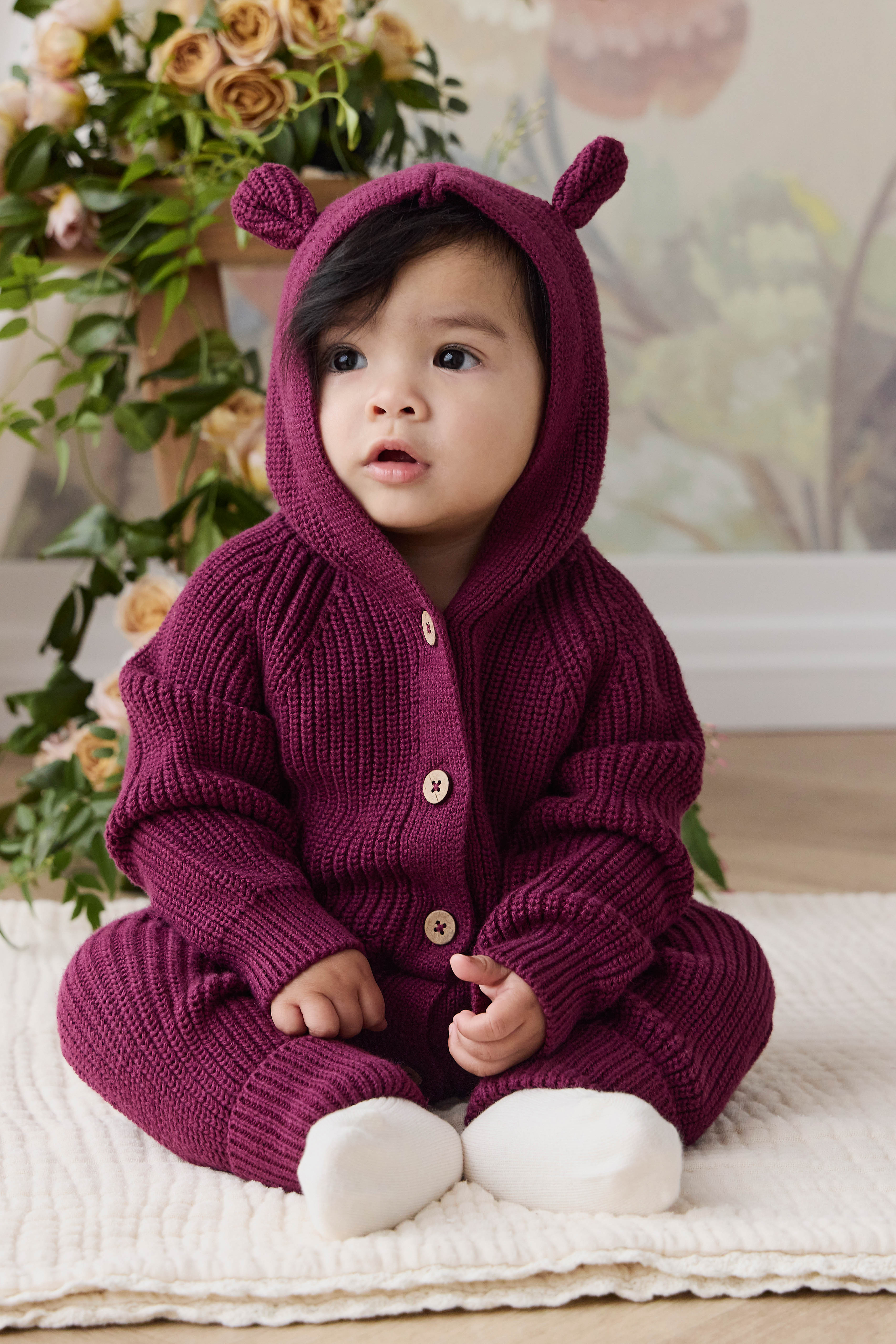 Grenouillère bébé en tricot à capuche avec oreilles d'ours et boutons en coton douillet